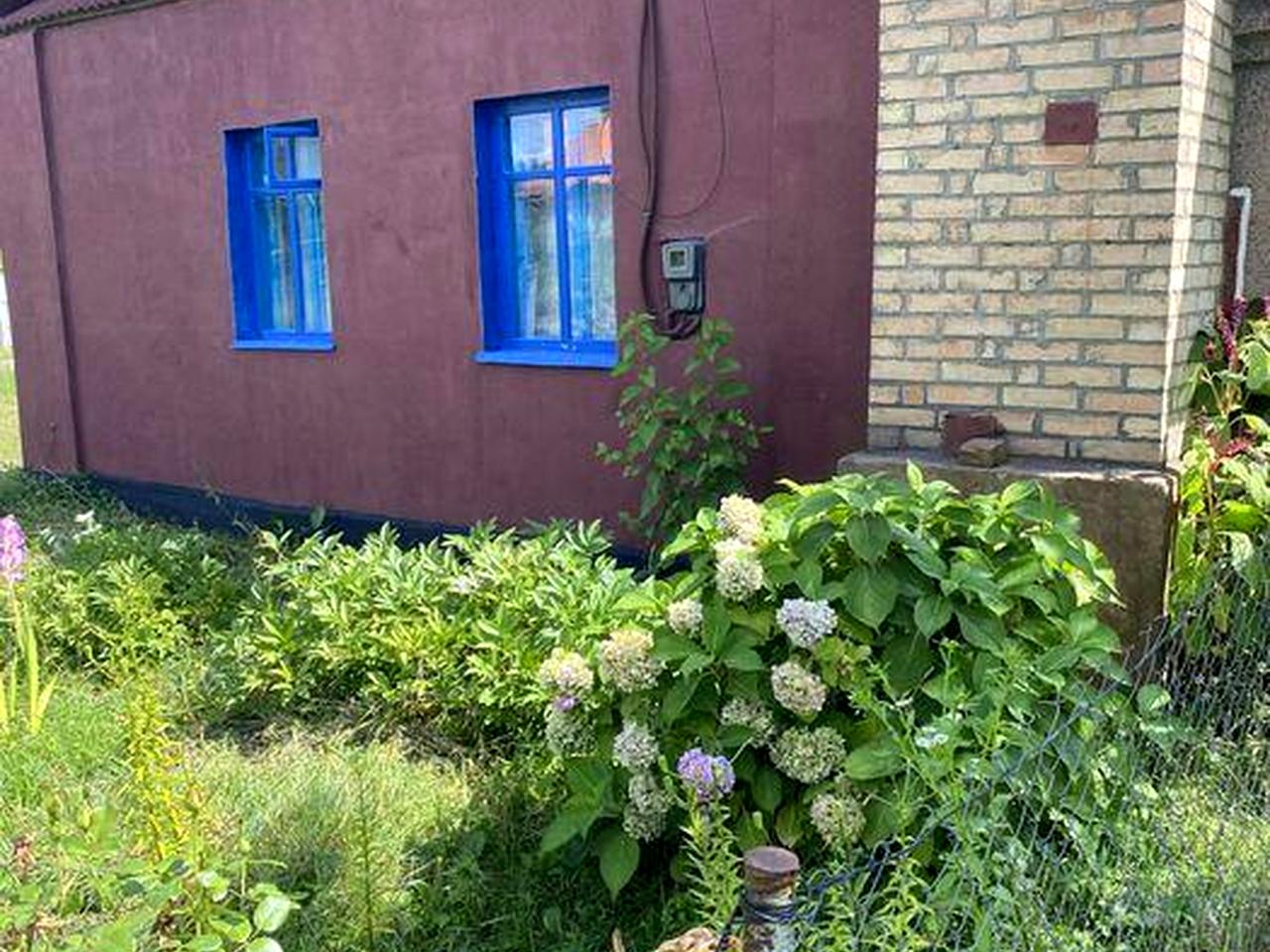 Продам будинок з приватизованою землею у черті міста