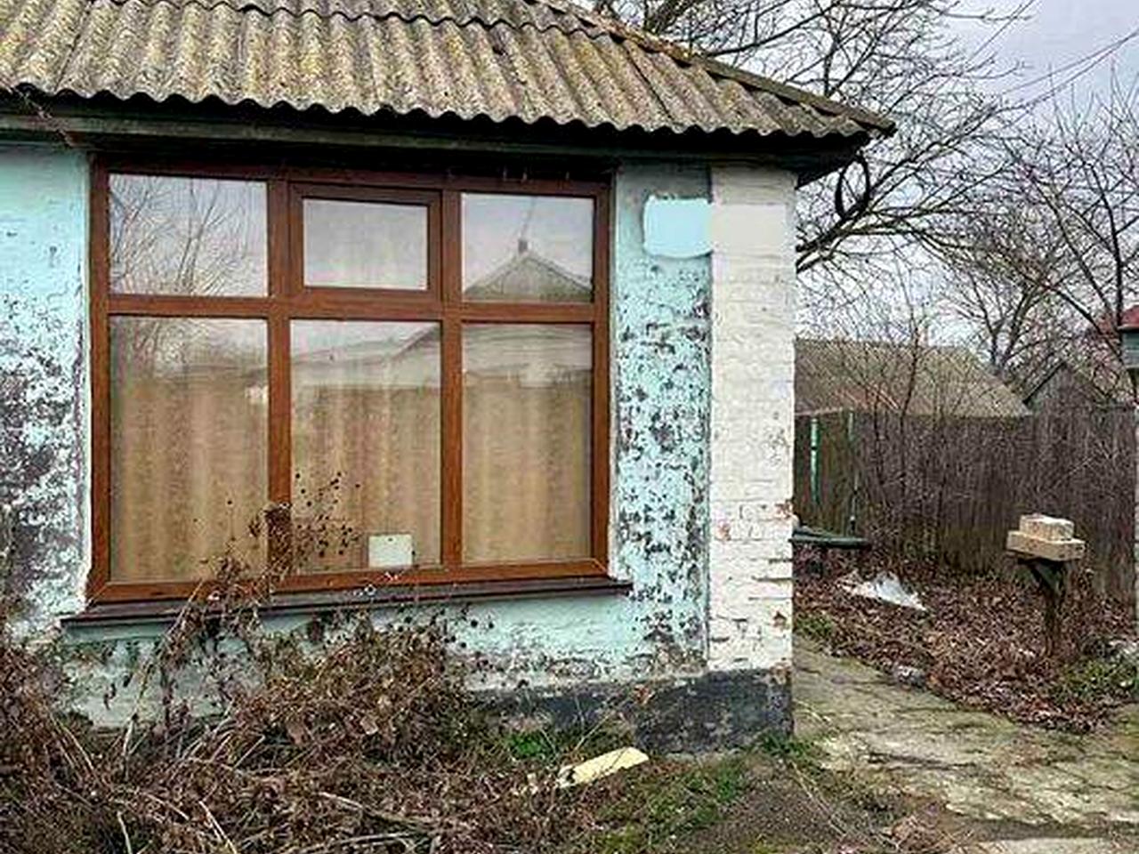 Пів будинку в центрі Баришівки