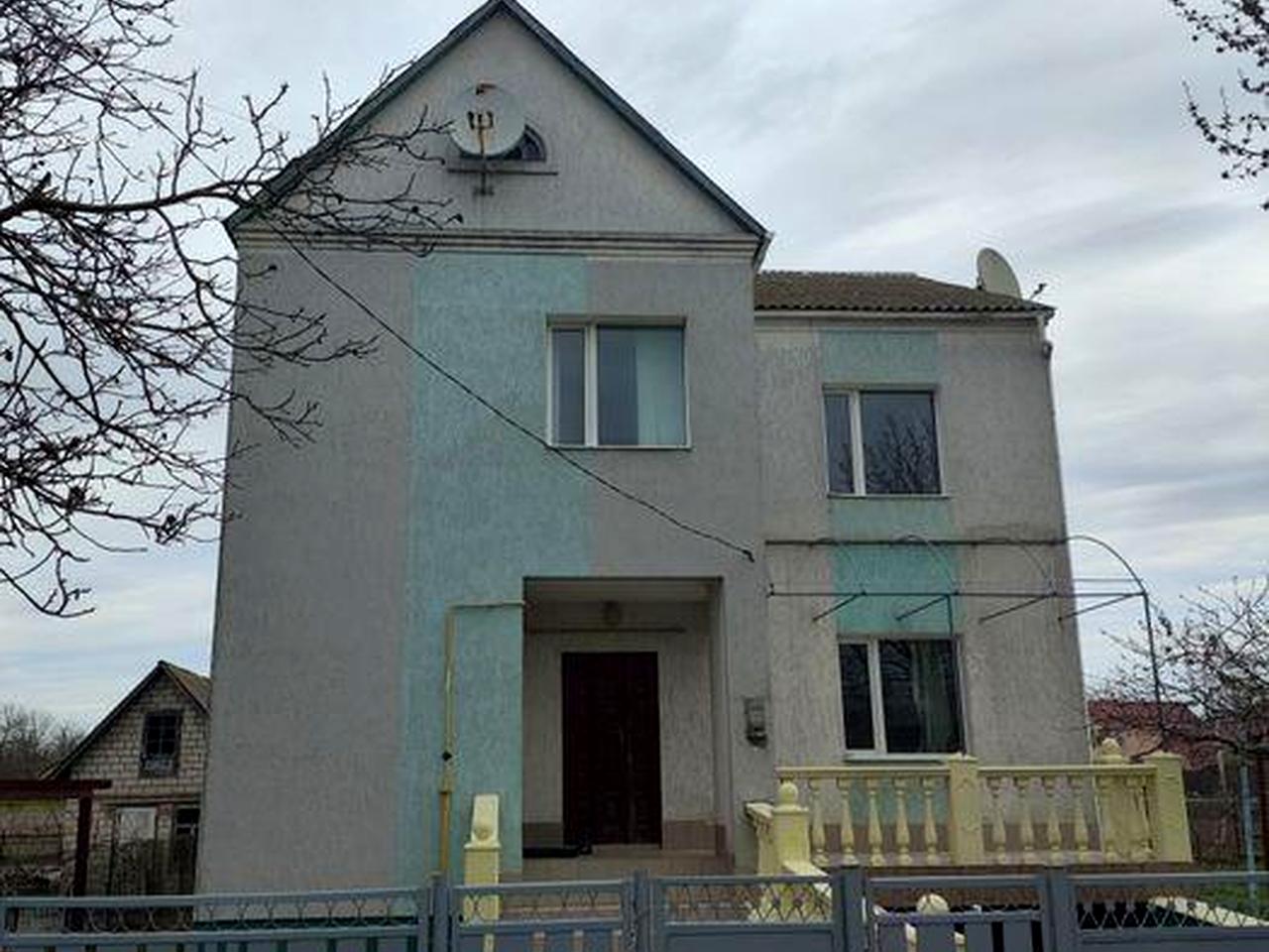 Будинок, гараж, земельна ділянка 10 соток