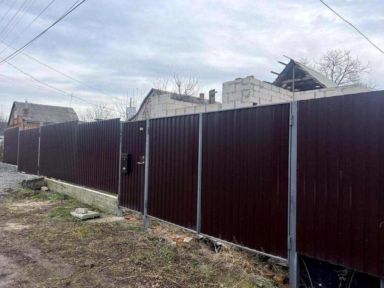 Ділянка з будинком під реконструкцію