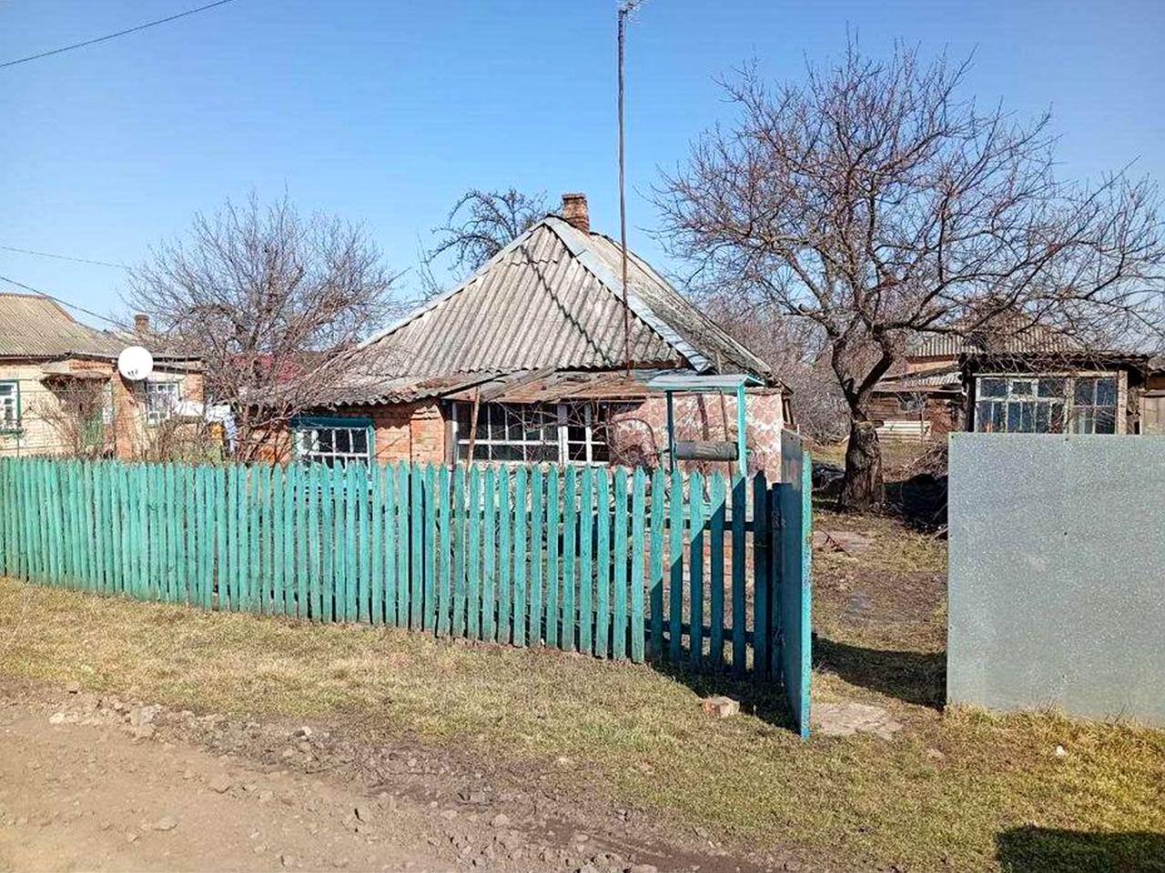 Земельна ділянка з будинком