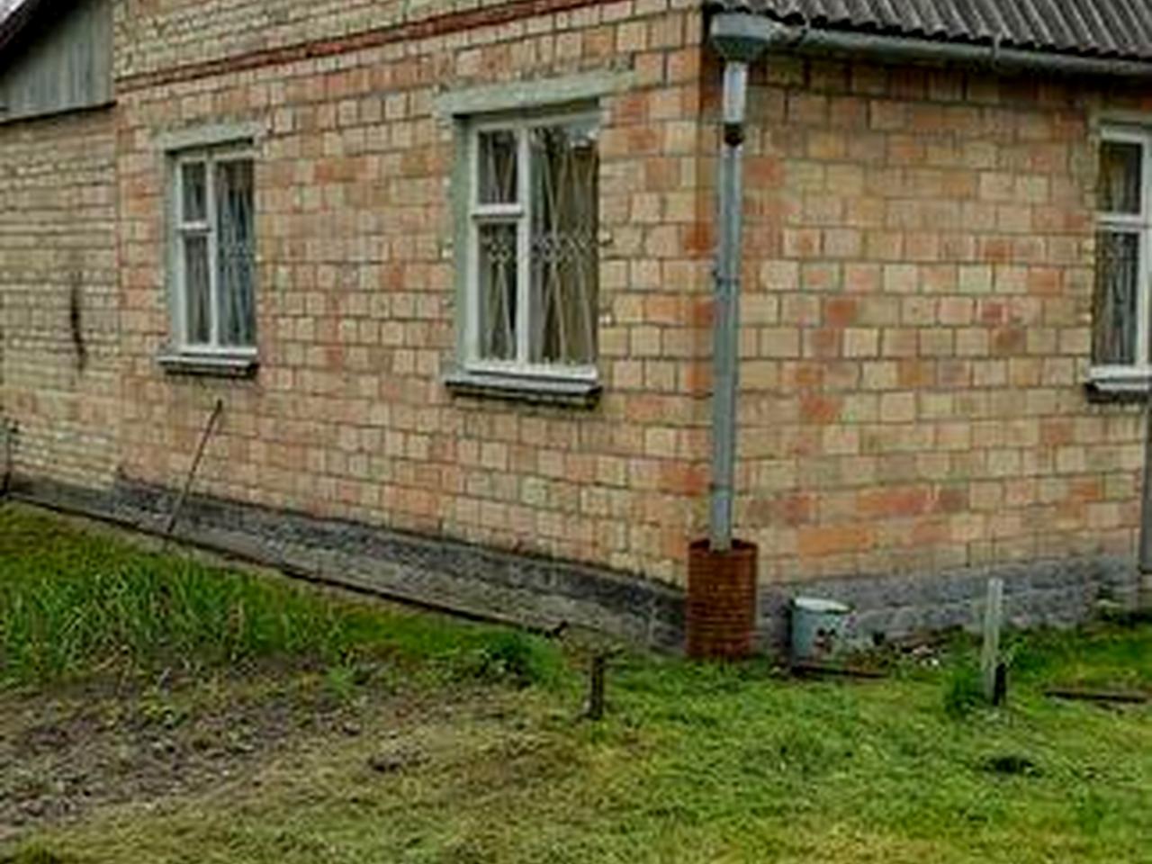 Будинок з земельною ділянкою в садовому товаристві