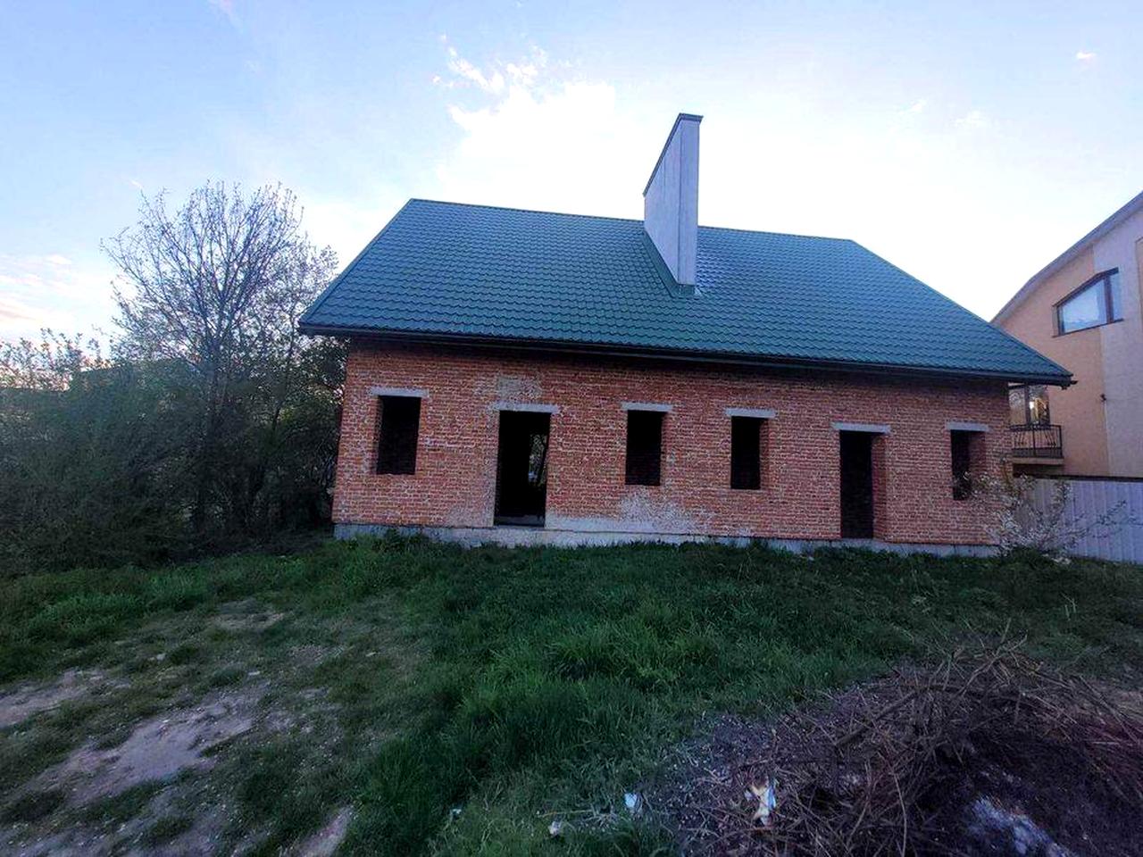 половина будинку та земельна ділянка 2,56 сот., м. Винники