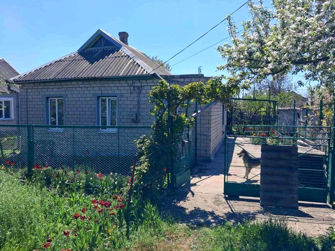 Будинок з приватизованою земельною ділянкою