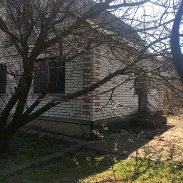 Ділянка з недобудованим будинком