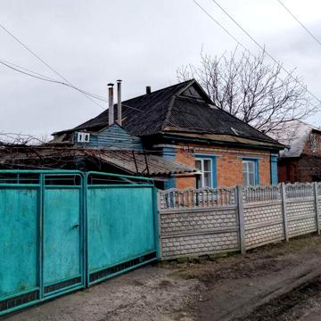 Продам 1/2 будинку