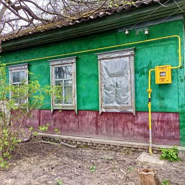 Продам  деревяний будинок