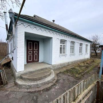 Будинок,нерухомість м.Тальне