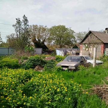 Участок с домом  в самом центре Великодолинского