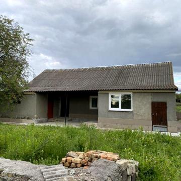 Будинок і земельна ділянка ланівці