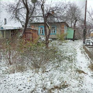 Продам дом с участком г. Ромны