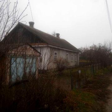 Продам будинок з земельною ділянкою 0,1774 га