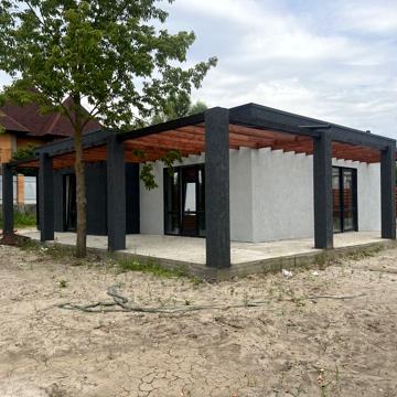 Будинок з опаленням в стилі High Тech ділянка 10сот