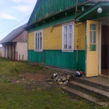 Деревʼяний будинок с. Обеніжи