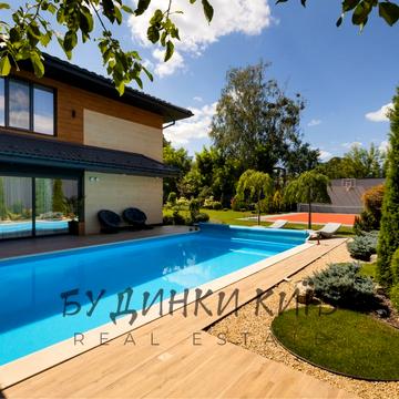 Продаж будинку з дизайнерським ремонтом в м. Київ  ( Чайка )