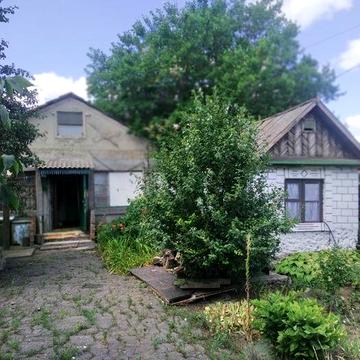 Рассмотрим обмен на гостинку. Хороший участок с домом ( под ремонт)