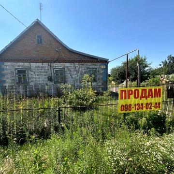 Продам дом в центре Новоалександровки