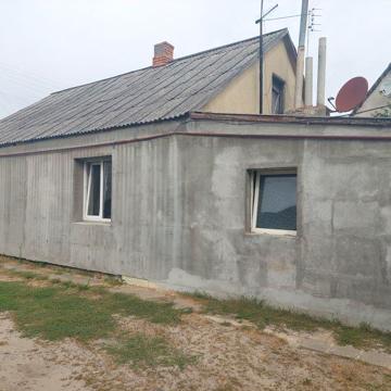 Продаж будинку в місті.