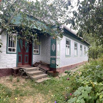 Продається будинок з ділянкою і господарськими будівлями