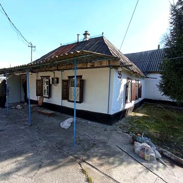 Продам дом с газовым отоплением в Подгородном