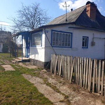 Будинок з земельною ділянкою смт Ружин