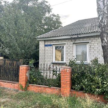 Продам пів будинку