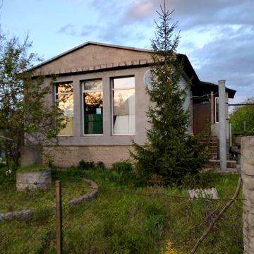 Дом с земельным участком в Романково