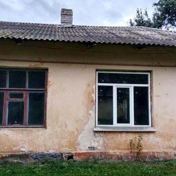 Дом без євро ремонту часть дома.