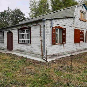 Будинок (земельна ділянка 0,31 га)