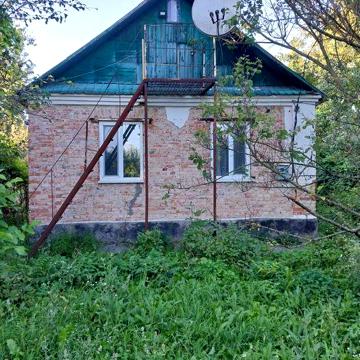 Продається цегляний будинок з городом Полонне