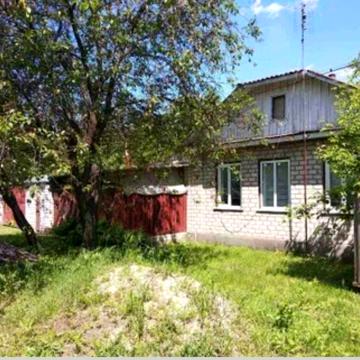 Продам будинок з земельною ділянкою .