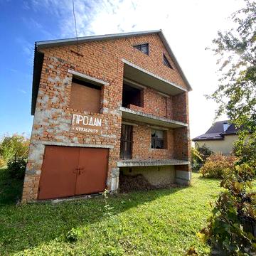 Будинок і земельна ділянка в м.Дунаївці