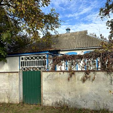 Приватний будинок + земельна ділянка