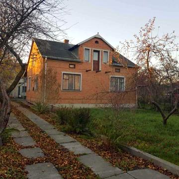 Житловий будинок та земельна ділянка 7,9 сот. м. Камянка-Бузька