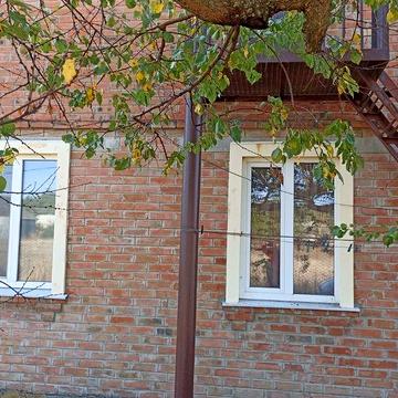 Будинок із земельною ділянкою у передмісті Полтави с.Микільське