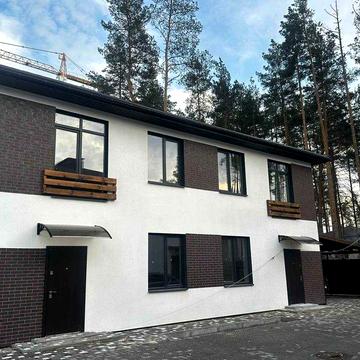 Дуплекс з великим підвалом та індивідуальним плануванням в Гостомелі