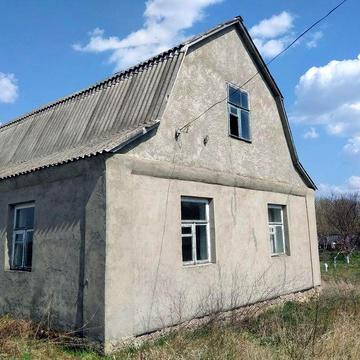 Земельна ділянка з будинком