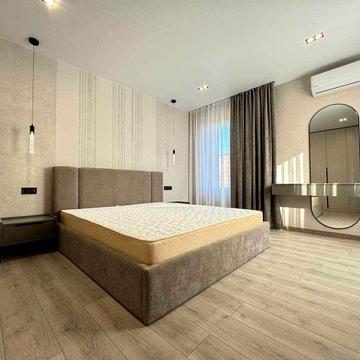 Стильна двокімнатна квартира з кухнею-студією