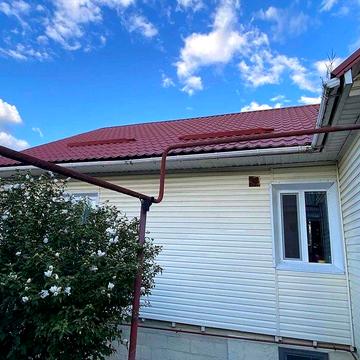 Продам 2-поверховий будинок з гаражем і ділянкою Таромське