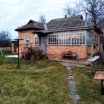 Продам  половину будинку м.Кобеляки