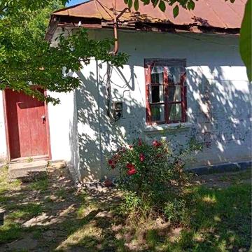 Продам пів будинку
