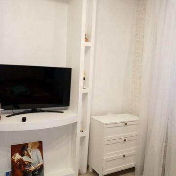 Квартиру в частном секторе с гаражом.