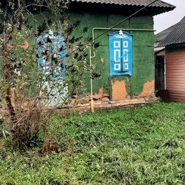 Продам  приватизовану земельну ділянку з будинком в центрі м.Ніжин