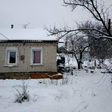 Продам 1/2  будинку в місті Фастові