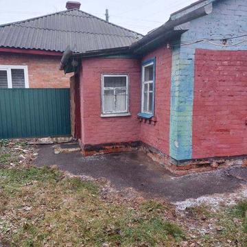 Продам півбудинку в центрі міста