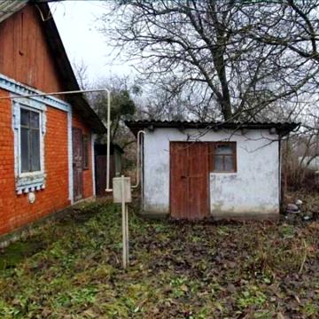 Будинок з земельною ділянкою