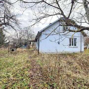 Цегляний будинок в центрі м. Калуш з земел. ділянкою