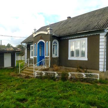 Будинок та земельна ділянка