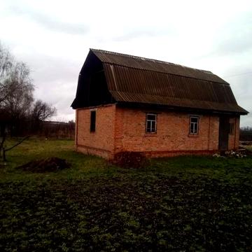 Дачний участок з недобудованим будинком.