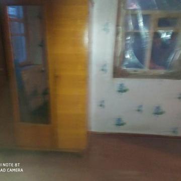 Продам  участок  15  соток  с  домом  в  Полтаве.